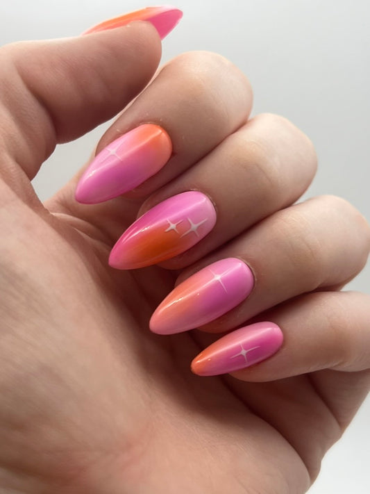 "Sunset Superstar” – Aura Nails with White Stars